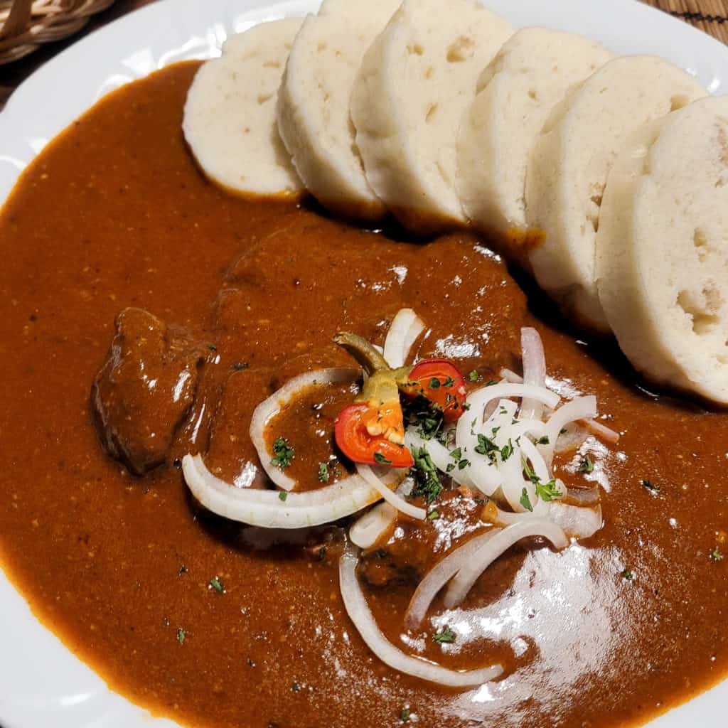 Czech goulash on a plate with bread dumplings