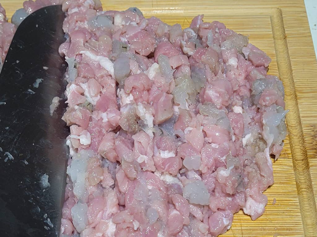 Chopped pork on a cutting board