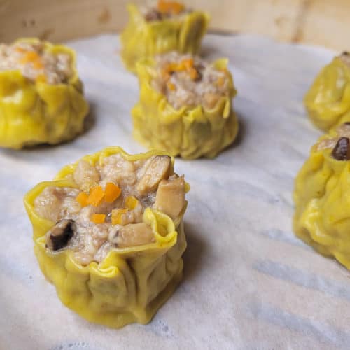 Closeup of siu mai in bamboo steamer