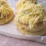 Closeup of ensaymada with cheese topping