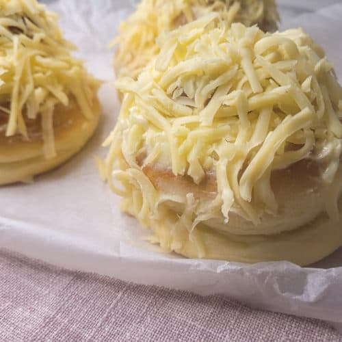 Closeup of ensaymada with cheese topping