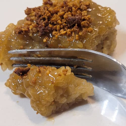 Fork and biko on a white plate