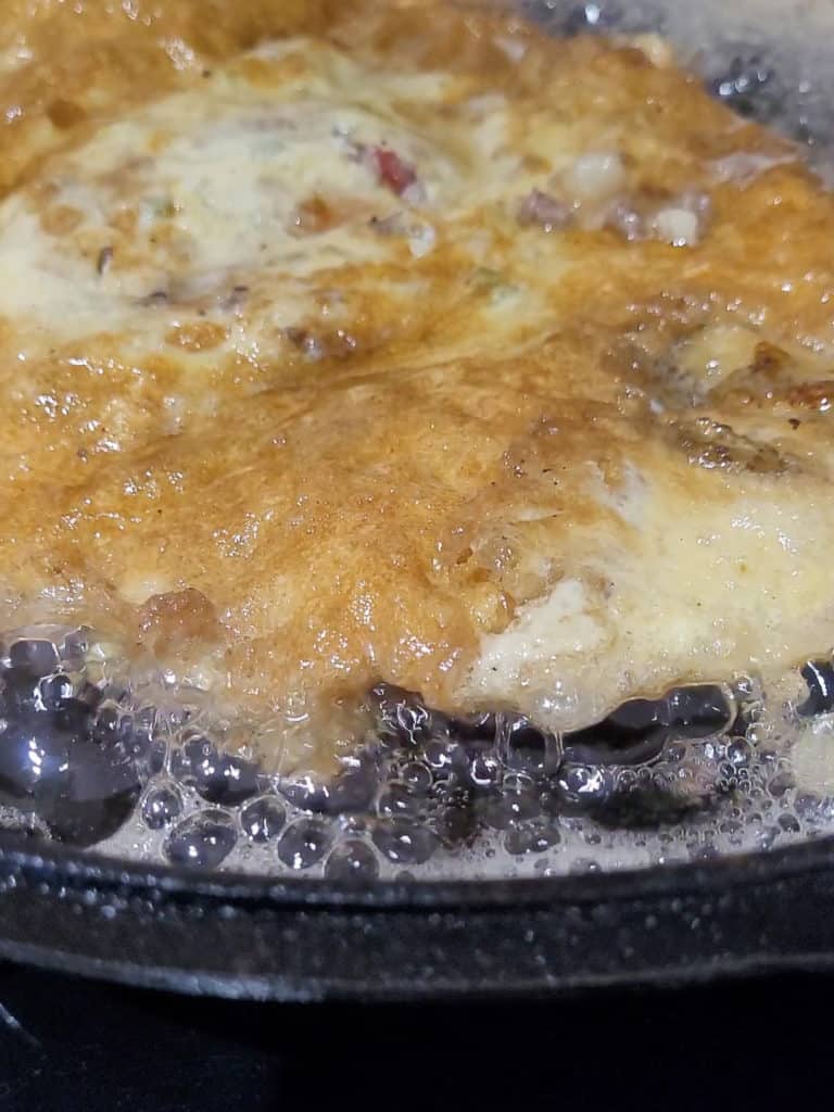 Close up of eggplant omelet in a cast iron