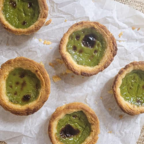 Overhead shot of matcha Portuguese egg tarts