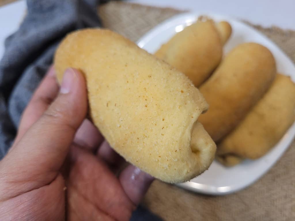 A closeup of the front of a bread roll