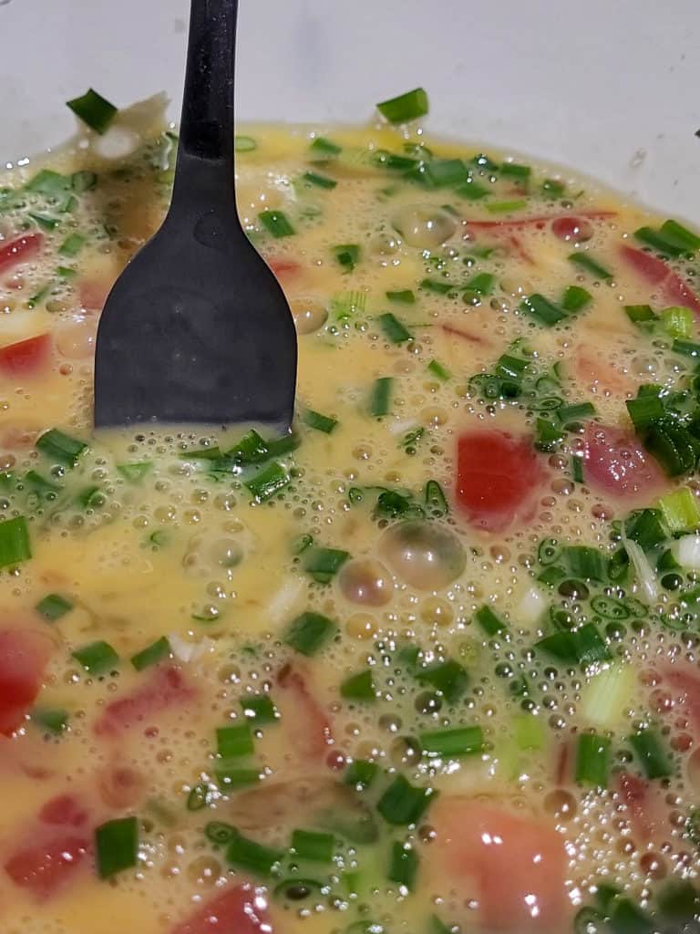 Vegetable mix in a bowl with a silver fork