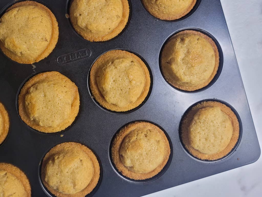 Overhead picture of baked muffins in a pan