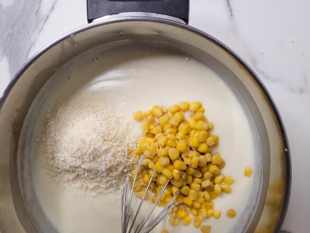 Pot with corn kernels and desiccated coconut