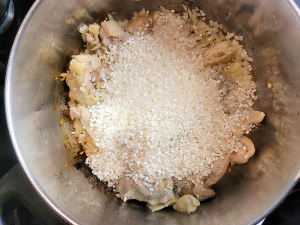 Rice and chicken in a silver pot