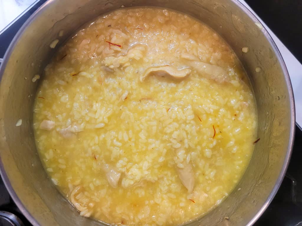 Finished arroz caldo in a pot