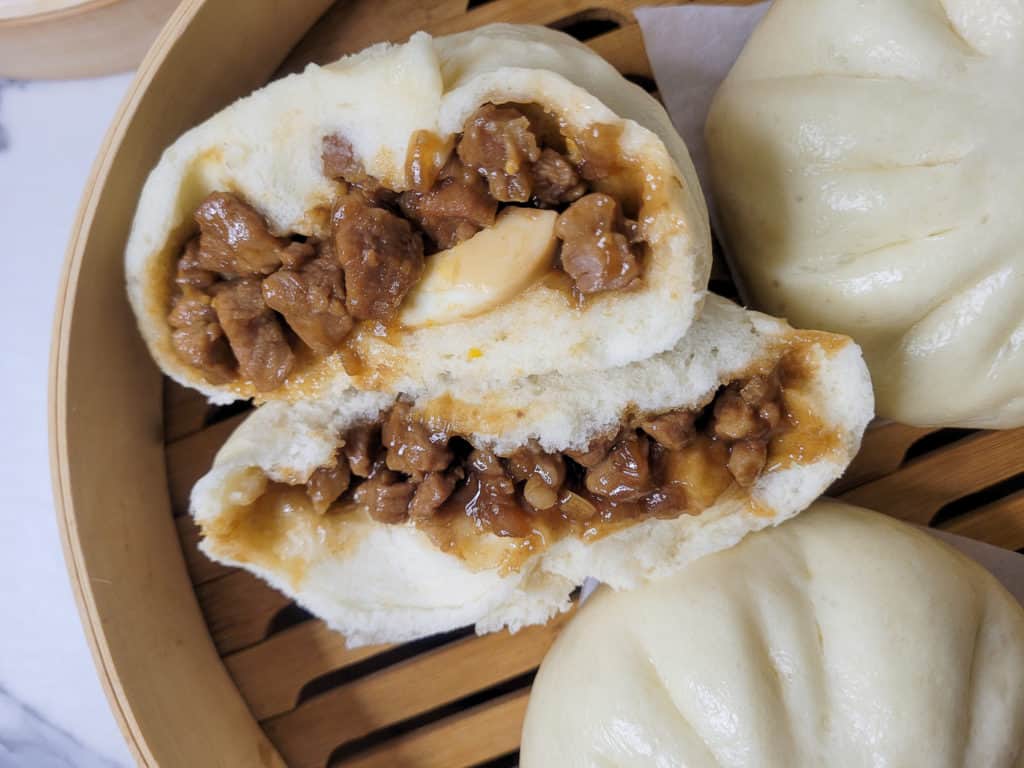 Closeup of cross section of siopao asado