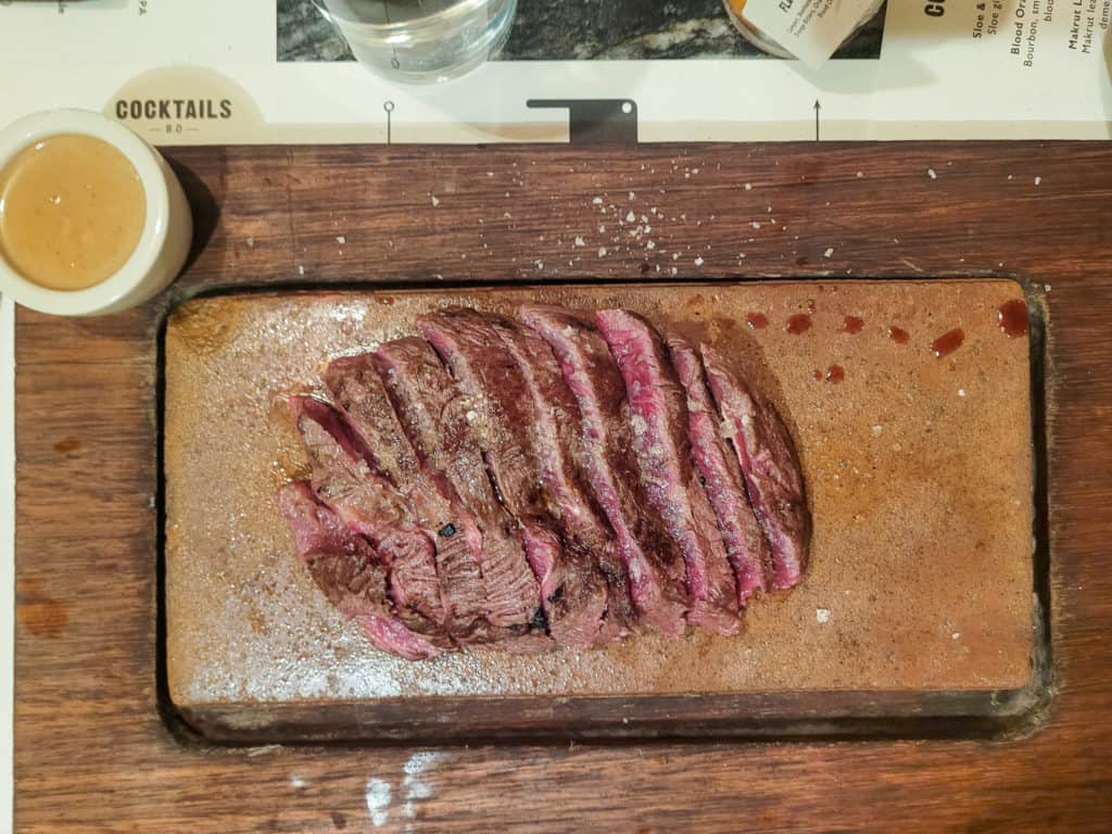 Overhead shot of a steak in Flat Iron restaurant London