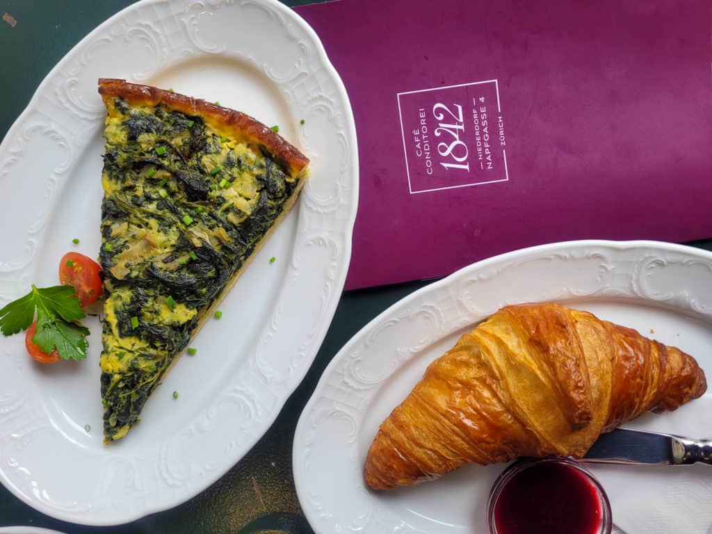 What to eat in Zurich: plates of breakfast food in Cafe Conditorei 1842