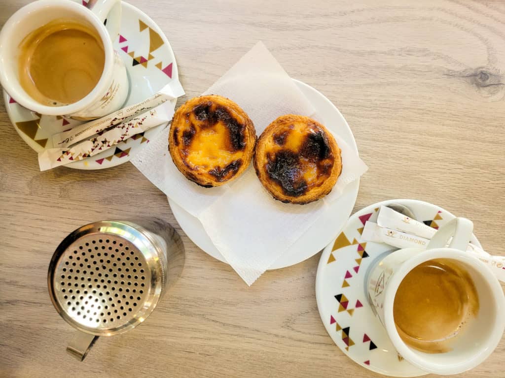 Pastel de Nata on a wood table with abatanados