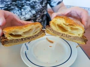 Cross section of foldhad de carne or meat puff in pastry