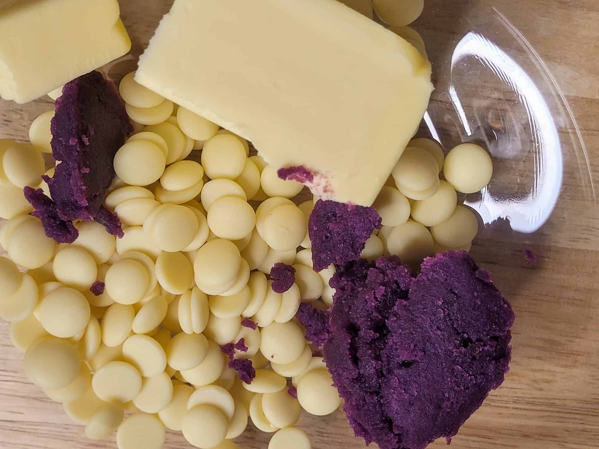 Closeup of glass bowl with ube halaya, butter, and white chocolate