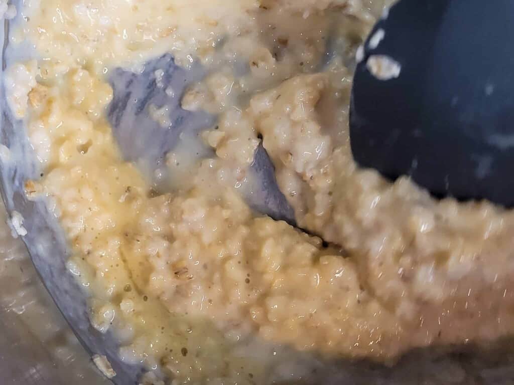 Eggs in oatmeal in a pot