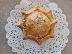 Mini pork pie on a plate