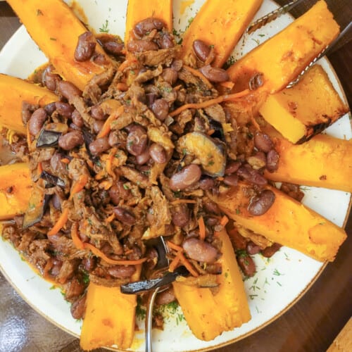 Slices of pumpkin with meat topping