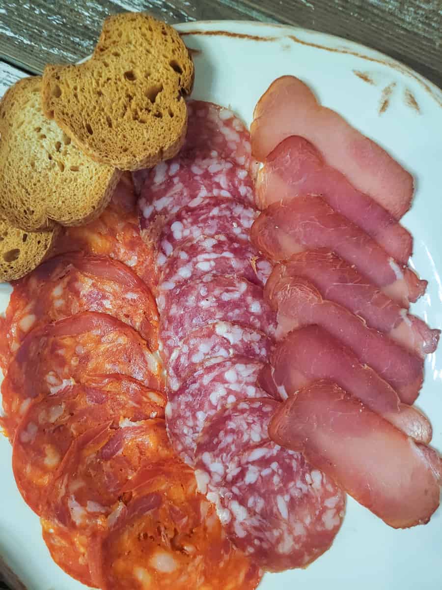 Meat plate with some bread slices