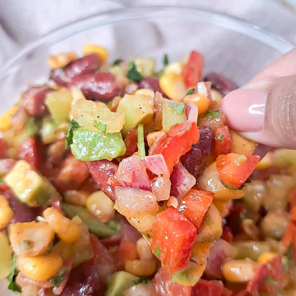 Cowboy caviar on a tortilla chip