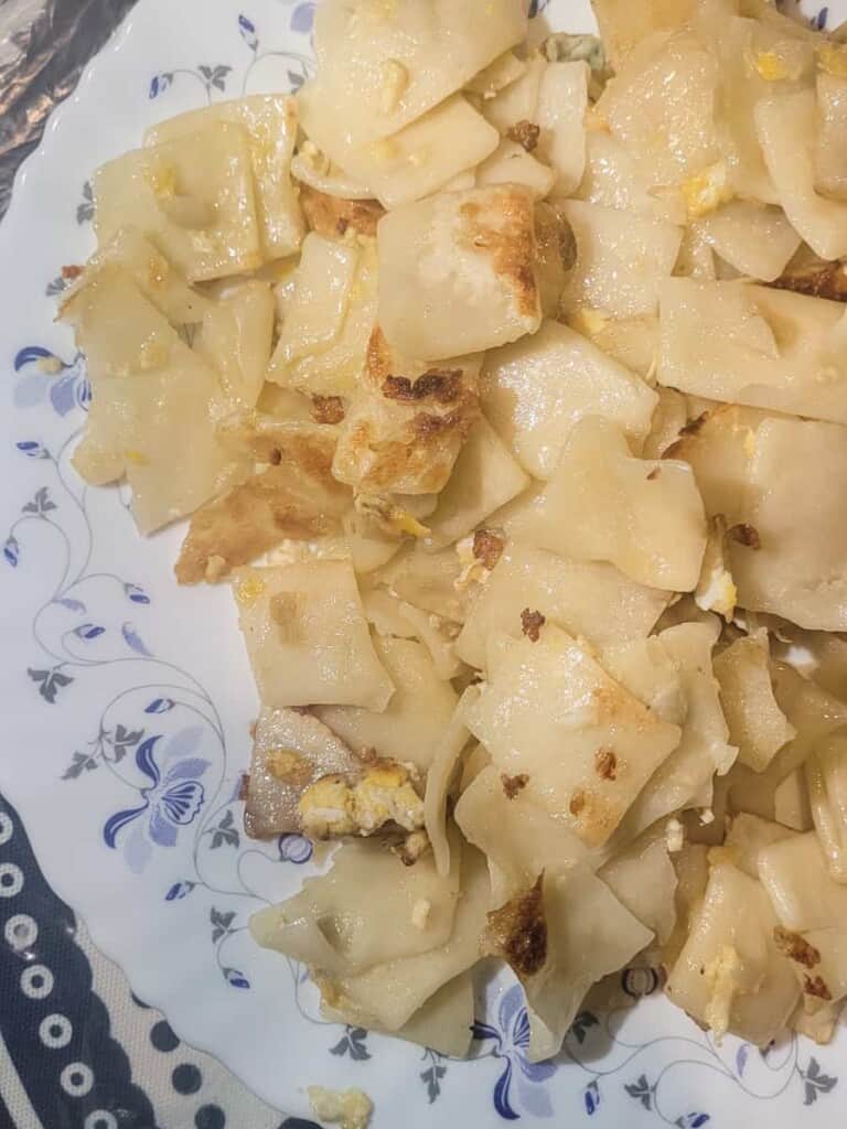 Fried leftover dumpling dough on a plate