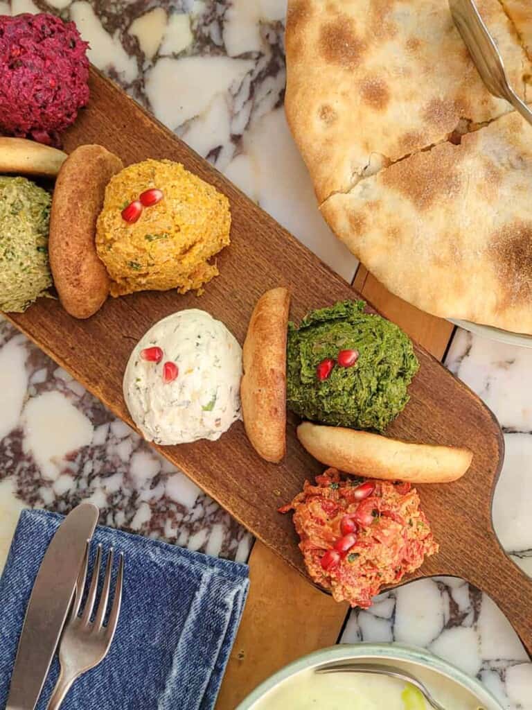 Georgian appetizers on a wooden serving board