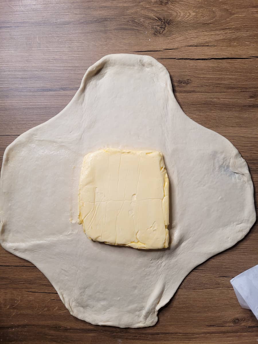 Butter slab at center of dough