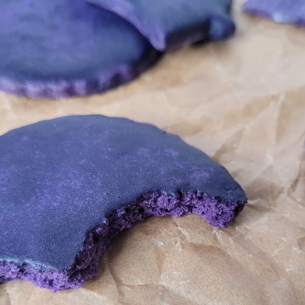 Bitten ube sugar cookie with icing