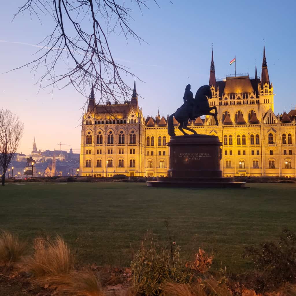 Silhouette of Equestrian statue of Ferenc II Rakoczi in front of Hungarian Parliament building