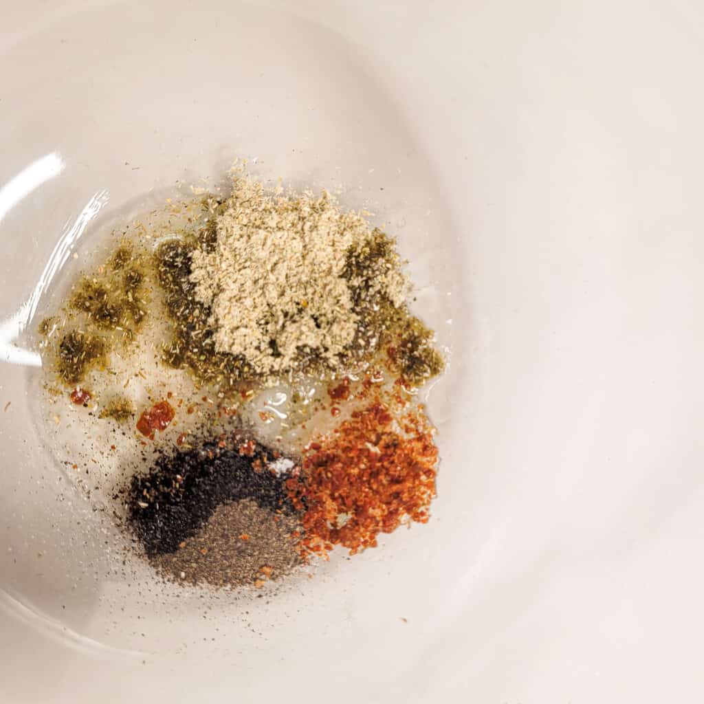 Spices for soko kecze of roasted mushrooms in a clear bowl