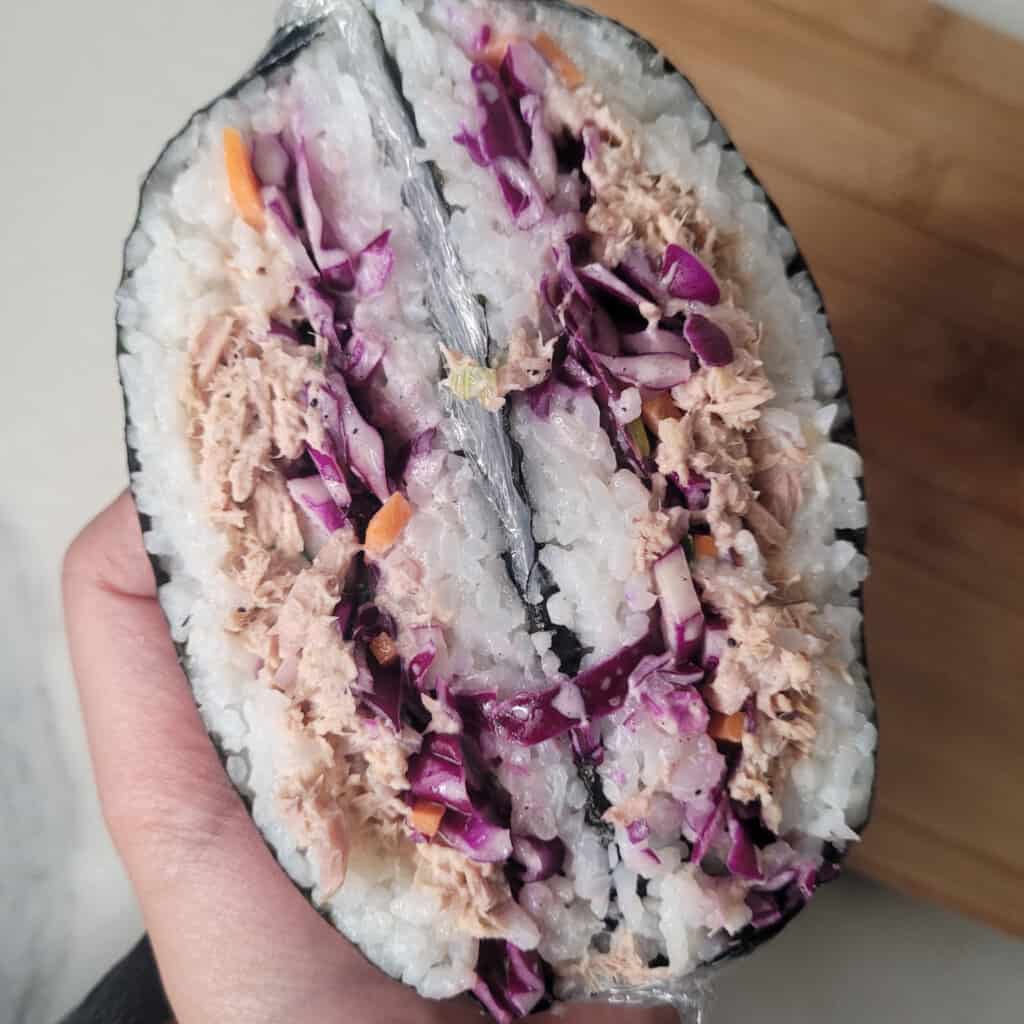 Tuna onigirazu (sushi sandwich) cut in half