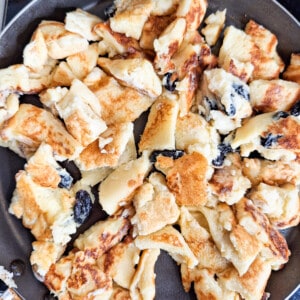Austrian Kaiserschmarrn or torn pancakes cooked in a pan