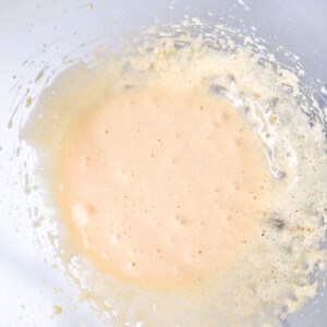 Bowl of creamed egg yolks, sugar and salt