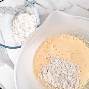 Add flour to bowl of pancake batter
