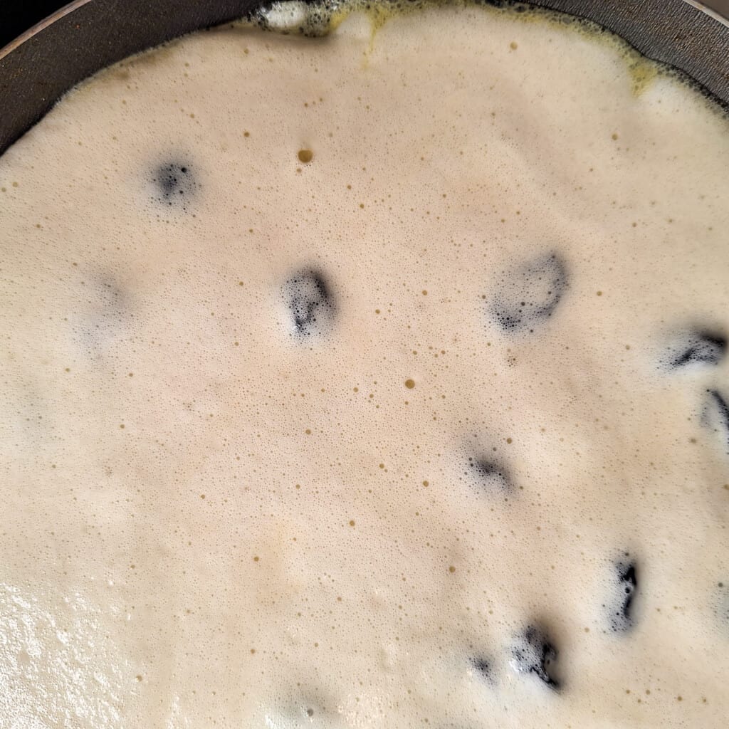 Pancake batter in a pan