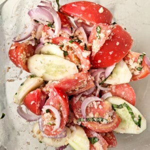 Georgian cucumber tomato salad in a glass bowl