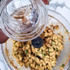 pouring water into walnut paste