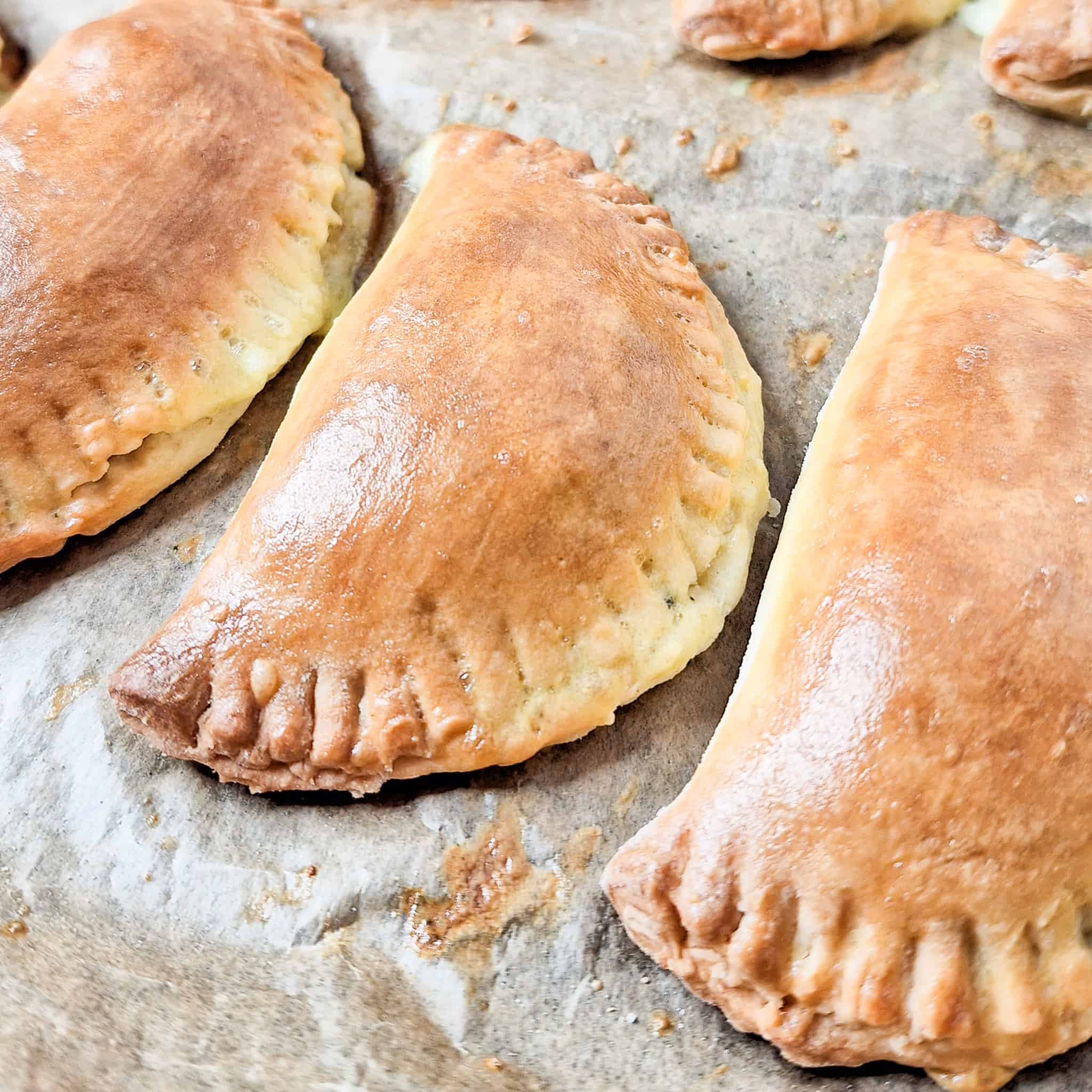 Closeup of baked Filipino meat empanadas