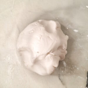 Plain glutinous rice dough in a plastic bowl