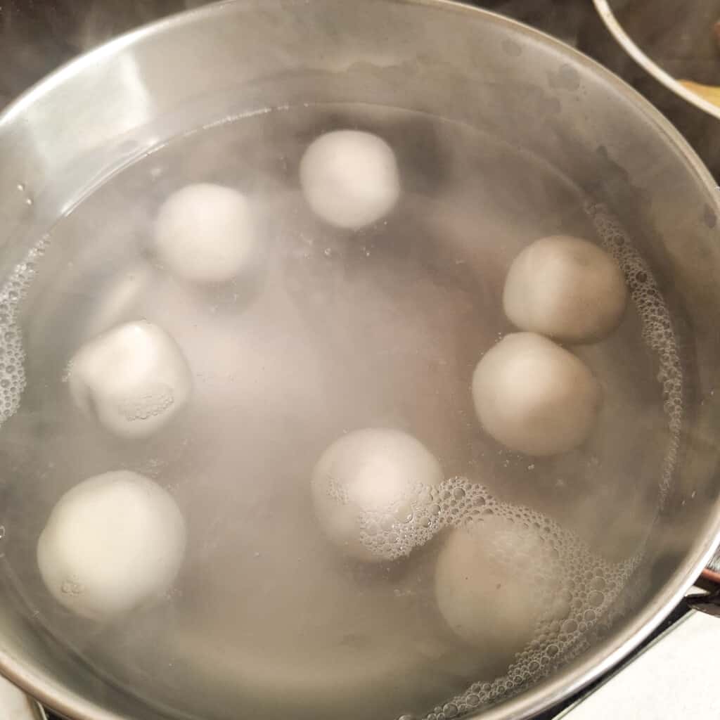 Floating cooked tang yuan in hot water